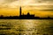 Silhouette of traditional pretty church complex on the canal in Venice, Italy