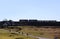 Silhouette of trains on embankment at Ribblehead