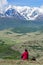 Silhouette of traveller with dog in the Mountains