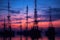 silhouette of trawlers mast and rigging against twilight sky