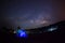 Silhouette of Tree with tent and Milky Way Phu Hin Rong Kla Nati