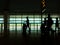 Silhouette, trip Summer flight on the gate in airport Background