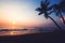 Silhouette tropical beach at sunset