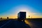 Silhouette of a truck at sunset