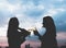 Silhouette two asia lesbian lgbt couple toast champagne glass at