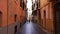 Silhouette of two girls walking on the medieval street in Palma de Mallorca