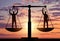 Silhouette of two men are equal to standing on the scales of justice.