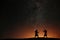 Silhouette of two samurais against the starry sky.