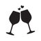 Silhouette of two sparkling glasses of wine or champagne with hearts between them. Cheers icon. Vector illustration