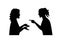 Silhouette of two women angry and shouting face to face