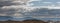 Silhouette of two women talking and hiking on a volcano trail