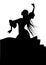 Silhouette of typical Spanish flamenco dancer woman with long mane