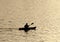 Silhouette of undefined kayaer on water at beautiful sunset time. Santa Cruz