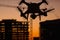 Silhouette of Unmanned Aircraft System UAV Quadcopter Drone In