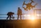 Silhouette of Unmanned Aircraft System UAV Quadcopter Drone In