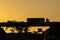 Silhouette of vehicles traveling at the intersection of the highways