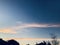 The silhouette view on the roof of building with sunrise light as background.