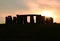 A silhouette view of Stonehenge at sunset