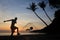 Silhouette Volley Kick football on the beach, Asian man play soccer at sunrise