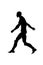 Silhouette of a walking determined man