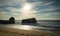 Silhouette of war blockhouse on scenic beautiful sandy beach seascape with waves on atlantic ocean