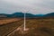 Silhouette of a wind turbine on a mountain at sunset, a windmill in the Ukrainian Carpathians, a windmill close up, top view