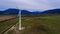 Silhouette of a wind turbine on a mountain at sunset, a windmill in the Ukrainian Carpathians, a windmill close up, top view