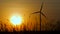 Silhouette of wind turbine over sunset ecology energy concept for electric maker the technology of alternate clean power form wind