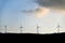 Silhouette windmills on a evening sky