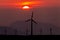 Silhouette of windturbines on an amazing sunset