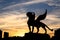 Silhouette of winged leopard statue at Wedding palace (Family center) at sunset, Kazan, Tatarstan, Russia