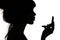 Silhouette of woman admiring herself in a mirror, profile of a woman face, concept of fashion and beauty