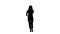 Silhouette Woman in casual walking and talking on the phone.