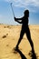 Silhouette of a woman with golf club