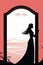 silhouette of a woman in a long dress standing in front of an open door