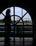 Silhouette woman opposite window railway station