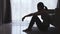 Silhouette of Woman suffering from depression lies on the sofa , has stress, anxiety, sickness and headaches, life problems,