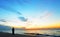 Silhouette woman,sunset on ocean Amity Point beach, North Stradbroke Island,Australia