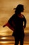 Silhouette woman super hero cape