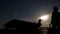 Silhouette of woman tourist going to airplane at runway in evening for boarding.