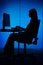 Silhouette of woman working computer (blind)