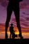 Silhouette womans legs with heels away cowboy saddle