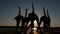 Silhouette of women group together doing stretching exercise, body fitness sport