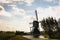 Silhouette of a wooden hollow post mill in a Dutch polder