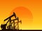 Silhouette of working oil pumps