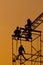 Silhouette of Workmen on assembling concert stage