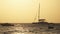 Silhouette Yacht with High Mast Sails at Sunset in the Ocean, Zanzibar, Africa