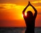 Silhouette of a yogi girl by the sea