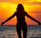 Silhouette of a yogi girl by the sea