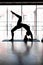 silhouette yogi woman exercising exercising doing Wild Thing, Flip-the-Dog exercise, Camatkarasana pose, exercising in